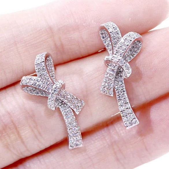 Wholesale Women's Sweet Style Copper Earrings With Inlaid Zircon And Bow Shape And Pattern