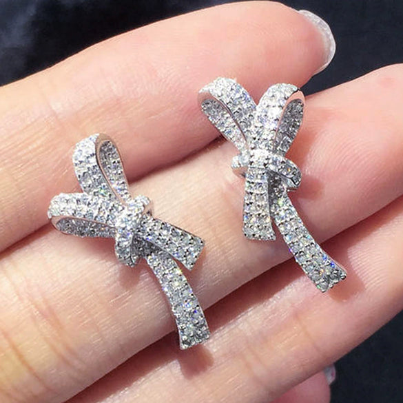 Wholesale Women's Sweet Style Copper Earrings With Inlaid Zircon And Bow Shape And Pattern