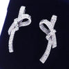 Wholesale Women's Sweet Style Copper Earrings With Inlaid Zircon And Bow Shape And Pattern