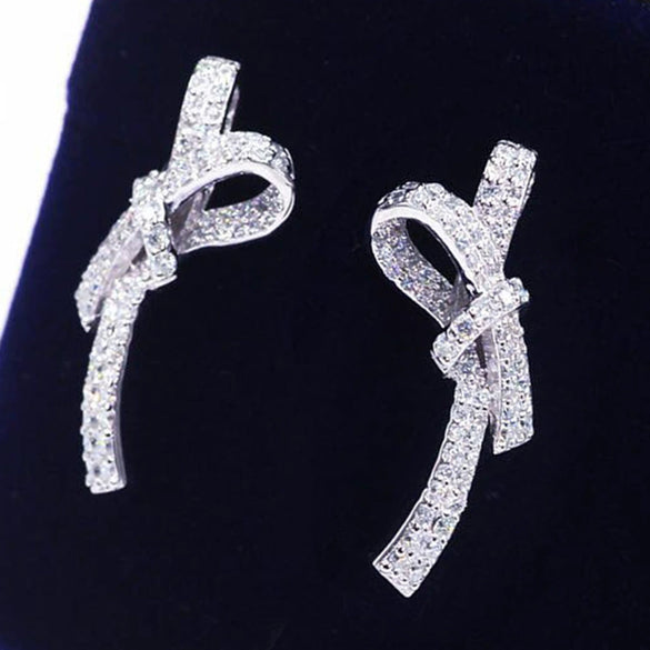 Wholesale Women's Sweet Style Copper Earrings With Inlaid Zircon And Bow Shape And Pattern