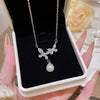 Wholesale Women's Titanium Steel And Copper Animal Zodiac Butterfly Zircon Pearl Pendant Necklace With Electroplating And Cross Chain