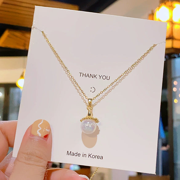 Wholesale Women's Titanium Steel And Copper Mermaid Geometric Light Luxury Collarbone Necklace With Diamond Design And Cross Chain