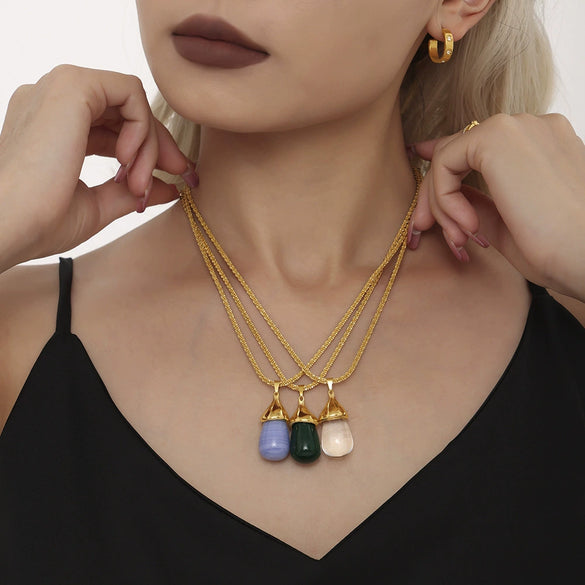 Wholesale Women's Titanium Steel And Resin Water Drop Pendant Cauliflower Texture Clavicle Necklace With Casting Process And 18K Real Gold Plated Color Retention