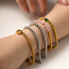 Wholesale Women's Titanium Steel And Stainless Steel Bracelet With 16K Gold Beads Green Love Zircon Geometric Pattern Electroplated