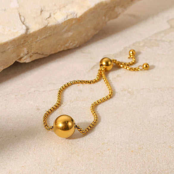 Wholesale Women's Titanium Steel And Stainless Steel Geometric Pattern Electroplated Bracelet With 18K Gold Ball Pendant