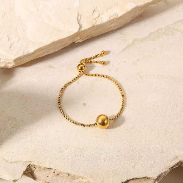 Wholesale Women's Titanium Steel And Stainless Steel Geometric Pattern Electroplated Bracelet With 18K Gold Ball Pendant