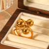 Wholesale Women's Titanium Steel And Stainless Steel Spherical Geometric Ring With 18K Gold Electroplating
