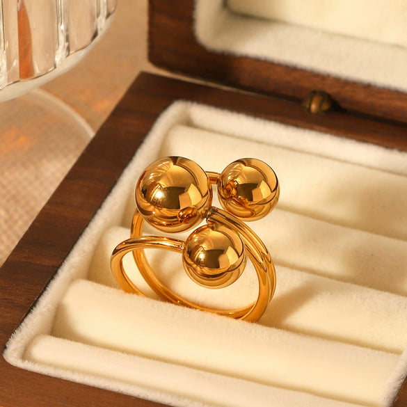 Wholesale Women's Titanium Steel And Stainless Steel Spherical Geometric Ring With 18K Gold Electroplating
