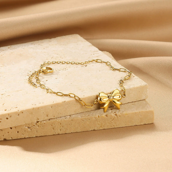 Wholesale Women's Titanium Steel Bow Pendant Bracelet With Geometric Pin Chain And Electroplating Design