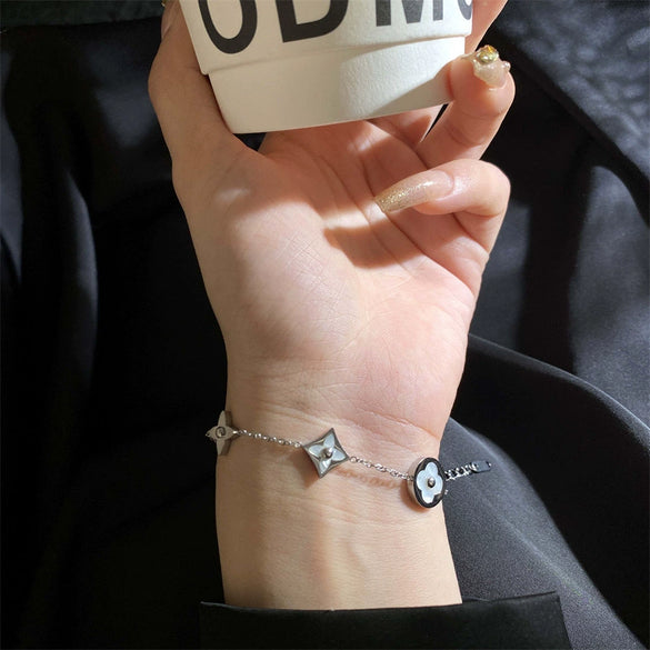 Wholesale Women's Titanium Steel Clover Peach Heart Love Roman Digital Round Beads Electroplated Bracelet