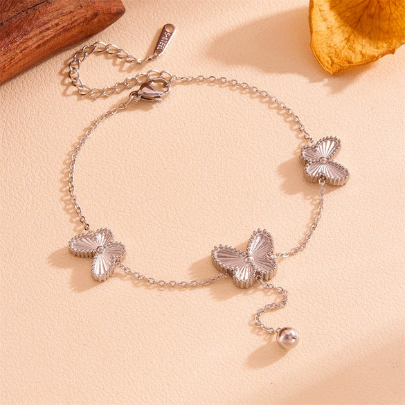 Wholesale Women's Titanium Steel Doublesided Butterfly Flower Ball Tassel Necklace With Geometric Pattern And Electroplating Treatment