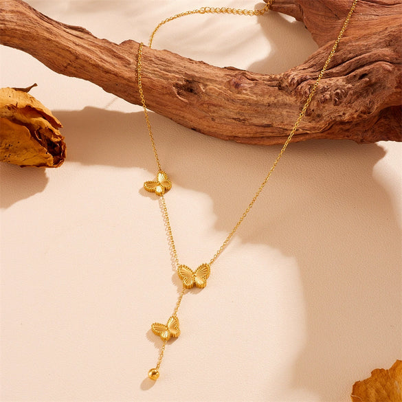 Wholesale Women's Titanium Steel Doublesided Butterfly Flower Ball Tassel Necklace With Geometric Pattern And Electroplating Treatment
