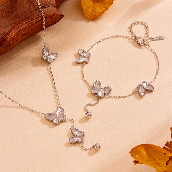 Wholesale Women's Titanium Steel Doublesided Butterfly Flower Ball Tassel Necklace With Geometric Pattern And Electroplating Treatment