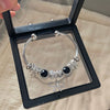Wholesale Women's Titanium Steel Electroplated Black Rose Bracelet With Black Bowknot Niche Retro Light Luxury Beaded Jewelry