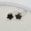 Wholesale Women's Titanium Steel Electroplated Fivepetal Flower Fivepointed Star And Leaf Earrings