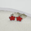 Wholesale Women's Titanium Steel Electroplated Fivepetal Flower Fivepointed Star And Leaf Earrings