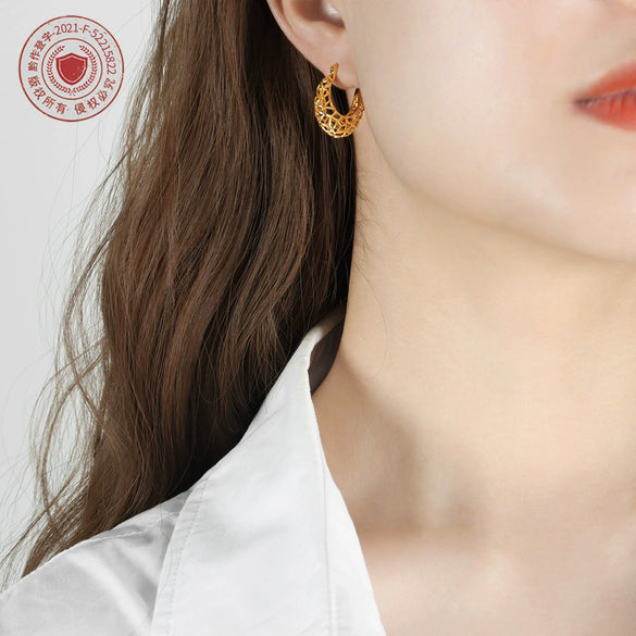 Wholesale Women's Titanium Steel Electroplated Irregular Hollow Circle Niche Design Earrings