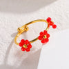 Wholesale Women's Titanium Steel Flower Beaded Ring With Electroplating Design