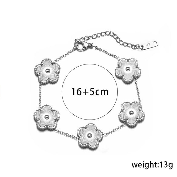 Wholesale Women's Titanium Steel Flower Jewelry Suit With Clover And Plum Blossom Laser Design Electroplated