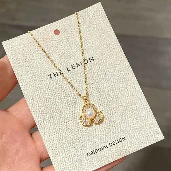 Wholesale Women's Titanium Steel Flower Pendant Necklace With Zirconia Inlay And Oshaped Chain Light Luxury Design