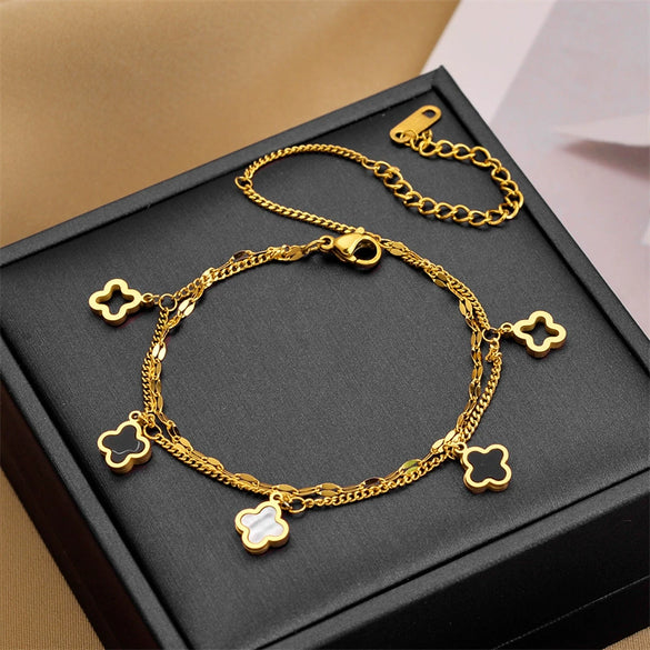 Wholesale Women's Titanium Steel Fourleaf Clover Hollow Inlaid Shell Pendant Bracelet With Geometric Styling And Electroplating Treatment