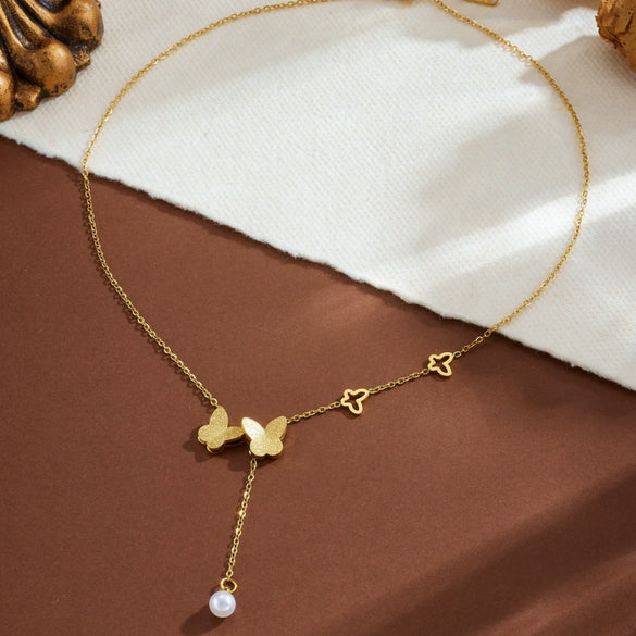Wholesale Women's Titanium Steel Geometric Butterfly Tassel Pearl Necklace With Real Gold Plating In The Furnace