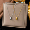 Wholesale Women's Titanium Steel Geometric Drop Shape Real Gold Plated Necklace With Rice Grain Chain Niche Minimalist Sporty Style
