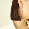 Wholesale Women's Titanium Steel Geometric Irregular Earrings With English Letter Stitching And Zircon Electroplated