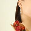 Wholesale Women's Titanium Steel Geometric Irregular Earrings With English Letter Stitching And Zircon Electroplated