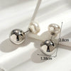 Wholesale Women's Titanium Steel Geometric Pearl Pendant Earrings Light Luxury Electroplated