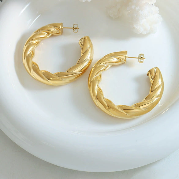 Wholesale Women's Titanium Steel Geometric Twist Exaggerated Earrings With Electroplating