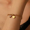 Wholesale Women's Titanium Steel Heart Bracelet With Electroplating Design