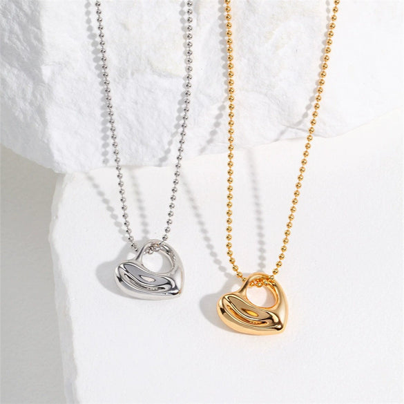 Wholesale Women's Titanium Steel Heartshaped Hollow Pendant Necklace With Electroplating