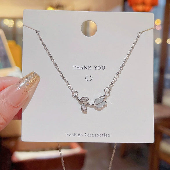 Wholesale Women's Titanium Steel Necklace With Zircon And Four Leaf Flower Pendant Set With Gems Cross Chain