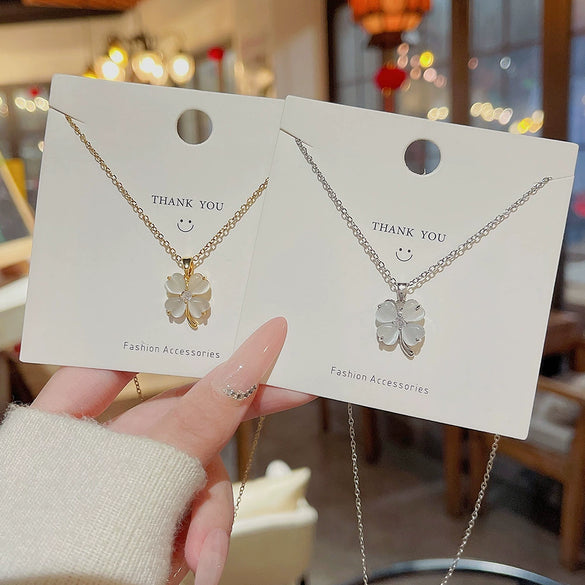 Wholesale Women's Titanium Steel Necklace With Zircon And Four Leaf Flower Pendant Set With Gems Cross Chain