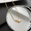 Wholesale Women's Titanium Steel Nonfading Necklace With Natural Pearl Pendant And Geometric Design Water Wave Chain