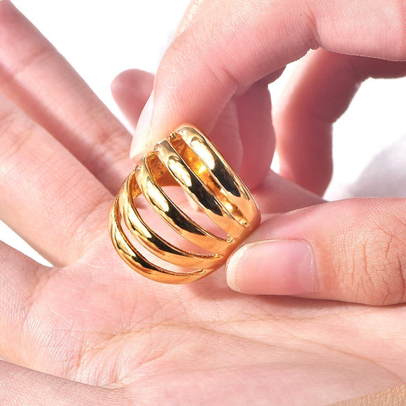 Wholesale Women's Titanium Steel Ring With Geometric Stripe Hollow Design And 18K Gold Plated Electroplating