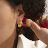 Wholesale Women's Twisted Hollow Geometric Titanium Steel Earrings Plated With 18K Real Gold Retro Design