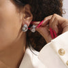Wholesale Women's Twisted Hollow Geometric Titanium Steel Earrings Plated With 18K Real Gold Retro Design
