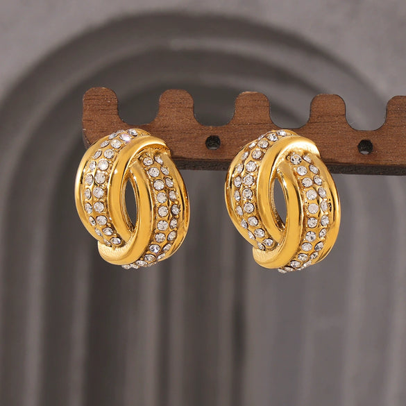 Wholesale Women's Twisted Hollow Geometric Titanium Steel Earrings Plated With 18K Real Gold Retro Design