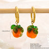 Wholesale Women's Unique Fruit Pattern Stainless Steel Electroplated Jewelry Set With O Word Chain Pendant Necklace And Pumpkin Earrings