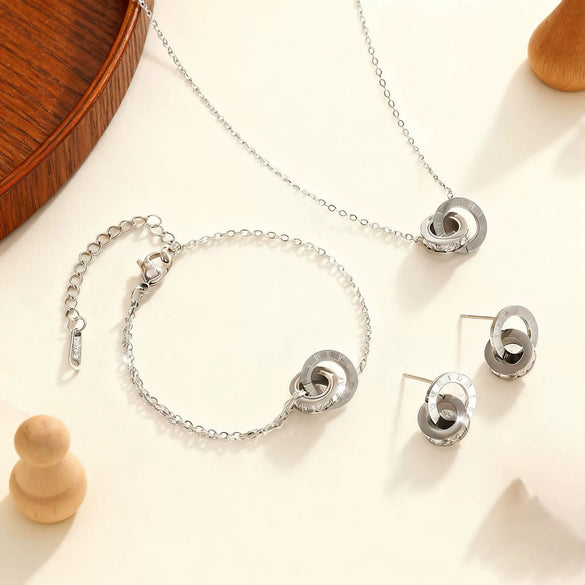 Wholesale Women's Versatile Interlocking Diamondencrusted Roman Jewelry Set With Cross Crown Roman Numerals Patterns Titanium Steel 18K Gold Plated Earrings Necklaces Bracelets