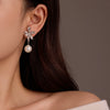 Wholesale Women's Vintage French Retro Joker Flower Pearl Stainless Steel Goldplated Earrings