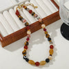 Wholesale Women's Vintage Geometric Handmade Multigem Beaded Bracelet With Red Agate Tiger Eye Stone Shell Spotted Stone Egg Yolk Stone And Stainless Steel