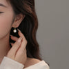 Wholesale Women's Vintage Geometric Round Earrings Made Of S925 Sterling Silver And Imitation Pearls With Electroplating