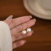 Wholesale Women's Vintage Geometric Round Earrings Made Of S925 Sterling Silver And Imitation Pearls With Electroplating