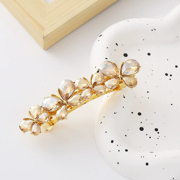 Wholesale Women's Zinc Alloy Hollow Metal Bow Spring Clip Hairpin With Electroplating And Baroque Style And Rhinestones