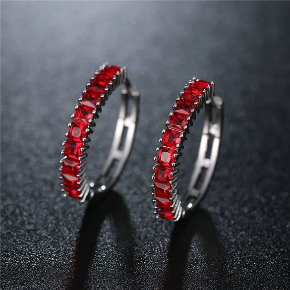 Wholesale Women's Zircon Earrings With Large Circle Shape And Single Row Crystal Featuring Flower Pattern And Electroplating Treatment
