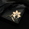 Wholesale Zinc Alloy Flower Pattern Electroplated Women's Fashion Simple Elegant Exquisite Versatile Cat's Eye Sweater Coat Pin Brooch Jewelry