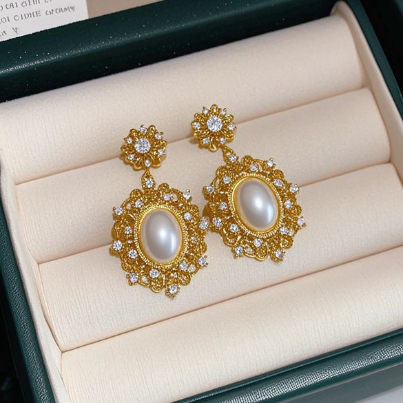 Wholesale Zinc Alloy Rhinestone Pearl Electroplated Geometric Oval Hollow Women's Earrings Retro Elegant Light Luxury